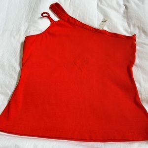 Maeve by Anthropologie orange one shoulder top.